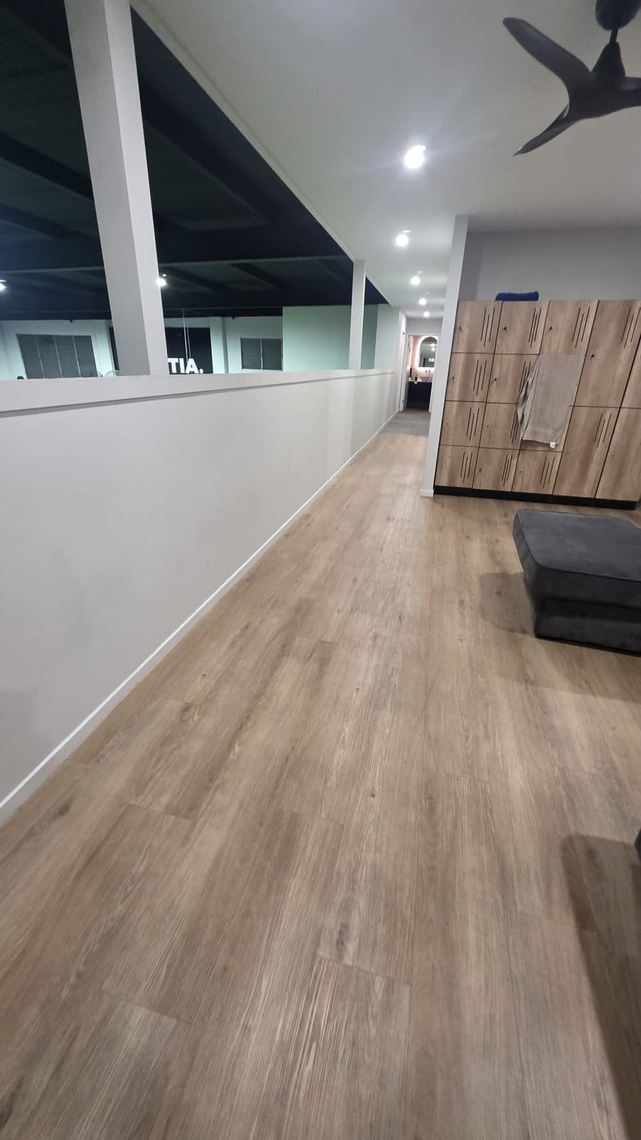 Fitness facility hallway and lockers after clean