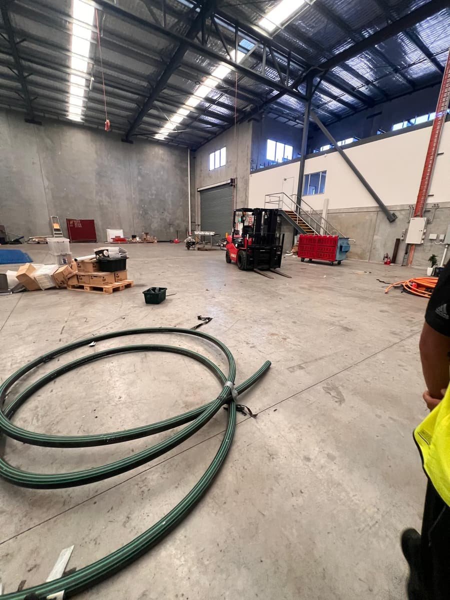 Warehouse floor and racking during a scheduled clean
